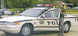 Tom in a 1996 Tulsa Police Ford Crown Vic